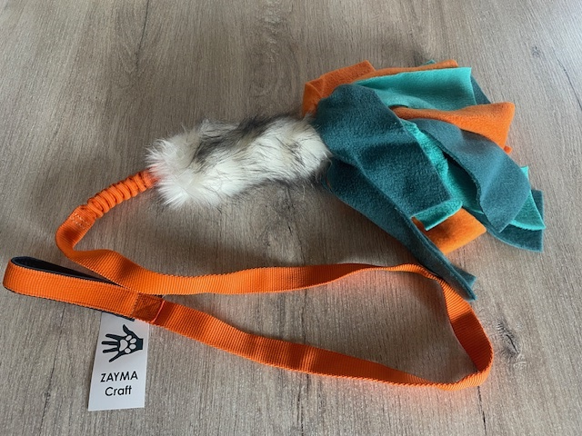 Tug Fausse fourrure et polaire avec couineur – Couleur orange